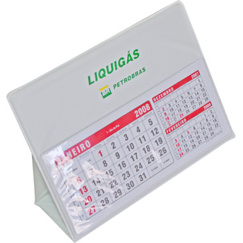 CALENDÁRIO DE MESA, EM LAMINADO DE PVC, COM FOLHINHAS